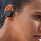 Langattomat Bluetooth-kuulokkeet, jotka roikkuvat korvassa