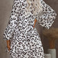 V-ringad klänning i leopardtryck